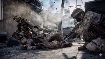 Some soldiers fighting and a soldier down on combat