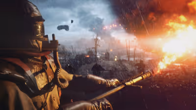 Gas-masked WWI soldier with a flamethrower faces a massive explosion on a dark, rainy trench battlefield in Battlefield 1.
