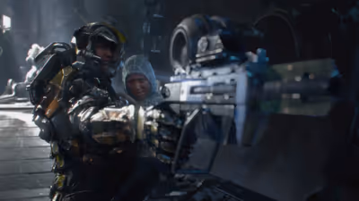 A heavily armored sci-fi soldier aiming a large futuristic rifle toward the camera while protecting a frightened, hooded civilian hiding behind her.