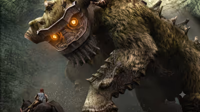 Wander riding his horse Agro facing Quadratus, the massive fur-covered second colossus with glowing orange eyes inside a rocky cavern in Shadow of the Colossus.